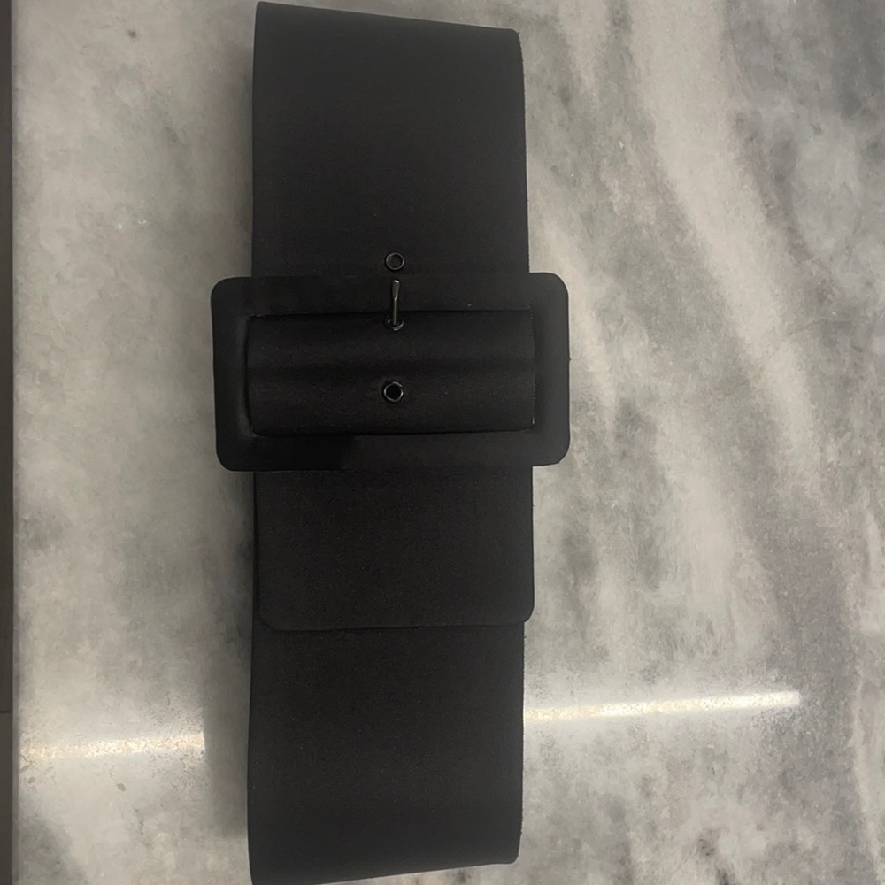 Bill Blass Wide Black Belt. Silky outer material. 4 in wide Large Buckle.